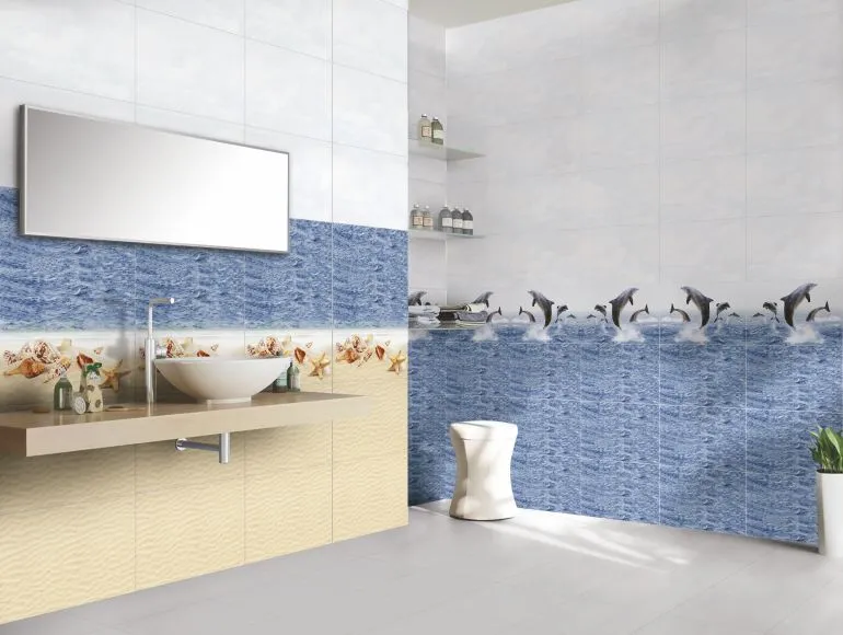 Stylish blue bathroom design with sink, mirror, and ocean-inspired tiles